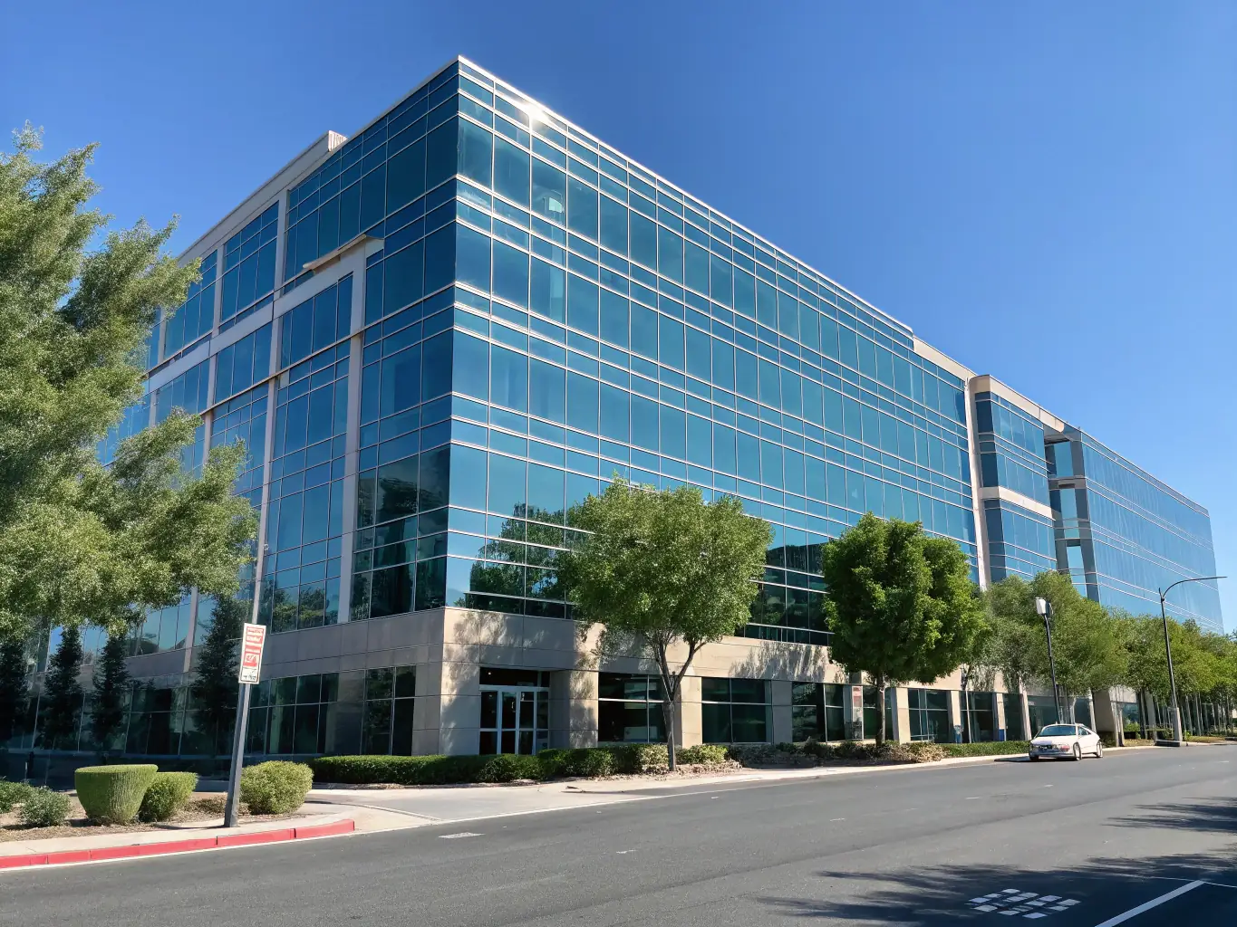 A commercial building with a spotless facade after pressure cleaning, highlighting Hi Flow Powerwash's commercial cleaning capabilities.